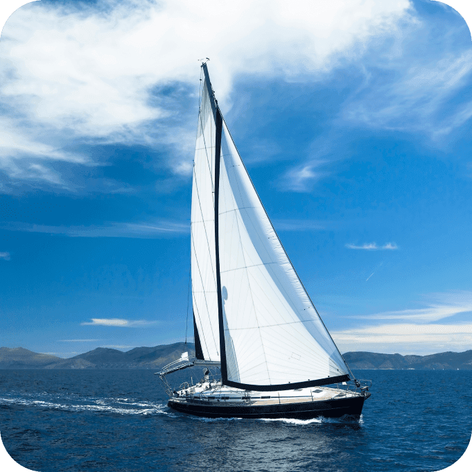 Sailing ship yachts with white sails in the sea