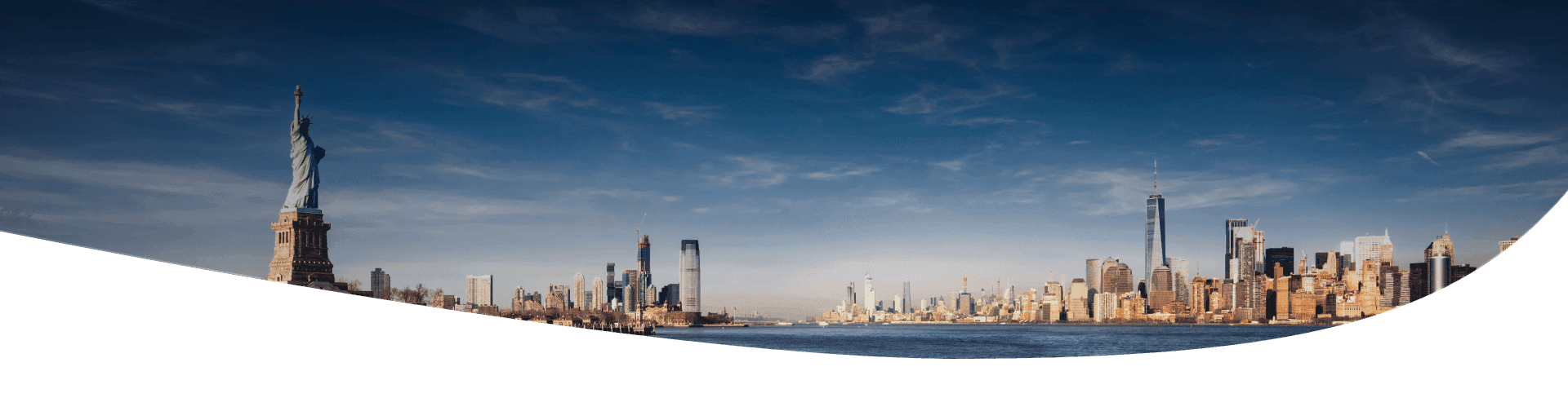 Panoramic view of New York City and the Statue of Liberty